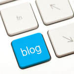 A keyboard button with the word "blog" written upon it.